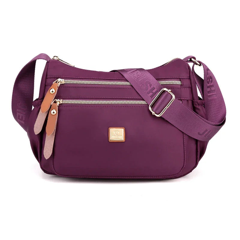 Shoulder strap bag with multiple compartments