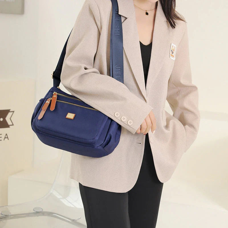 Shoulder strap bag with multiple compartments