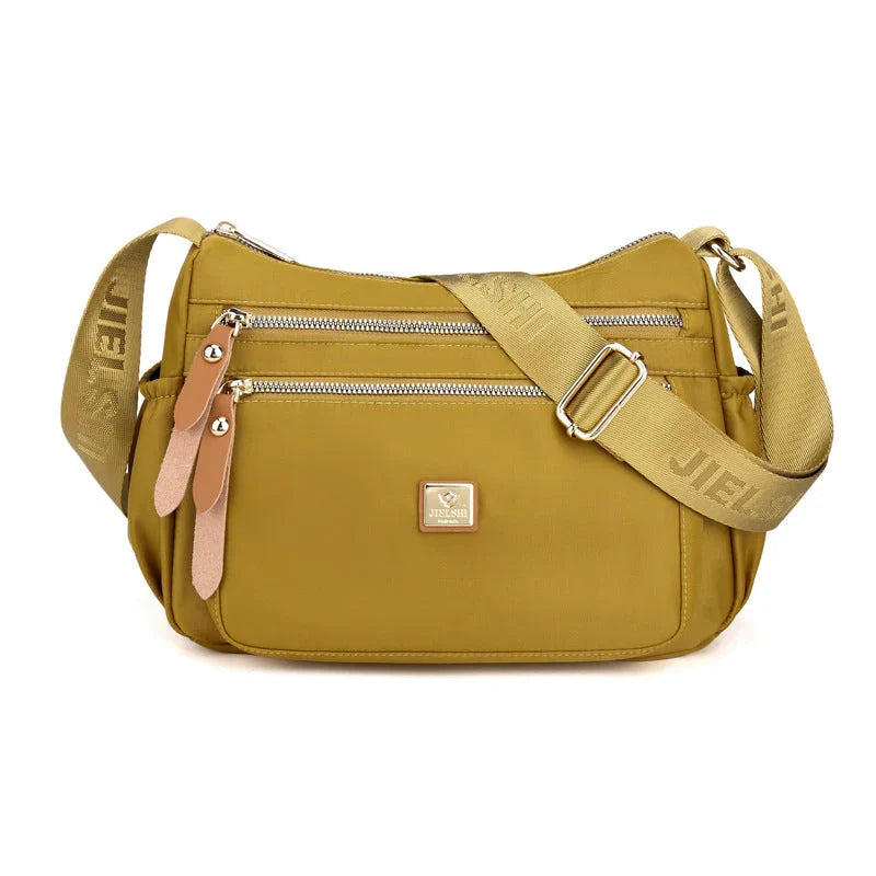 Shoulder strap bag with multiple compartments