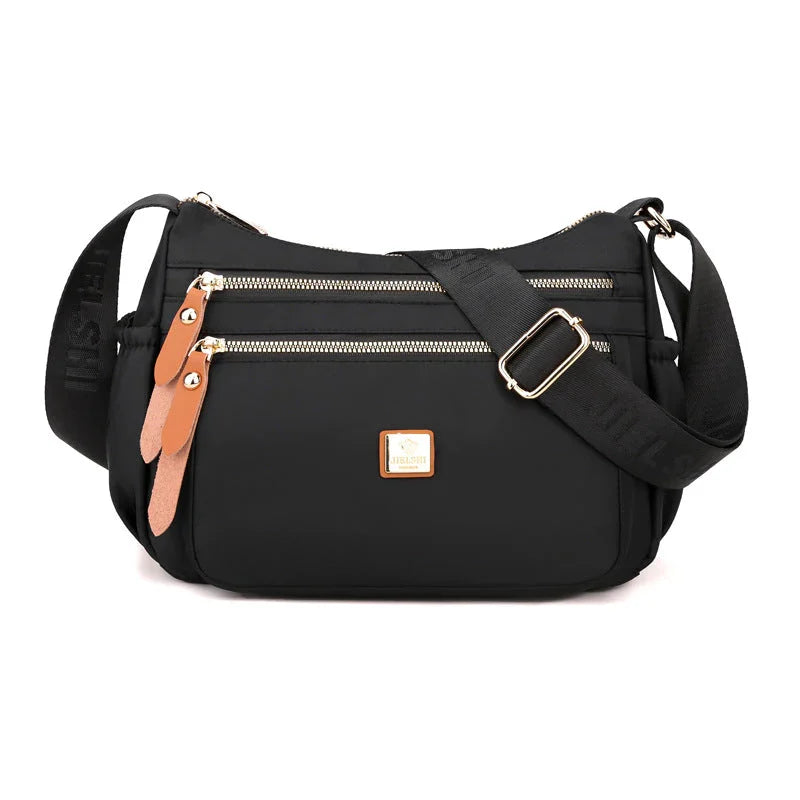 Shoulder strap bag with multiple compartments