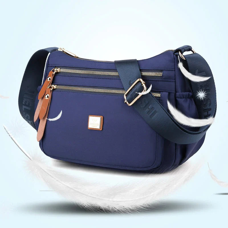 Shoulder strap bag with multiple compartments