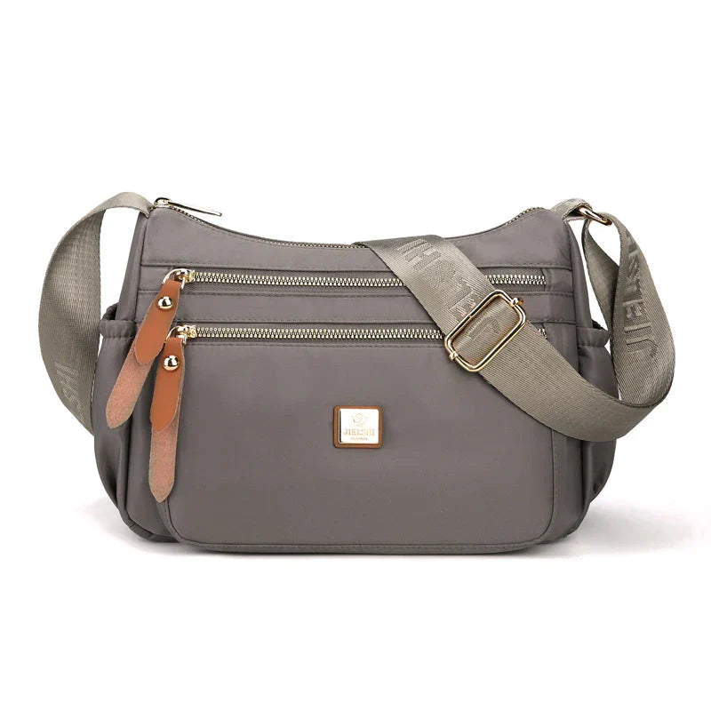 Shoulder strap bag with multiple compartments