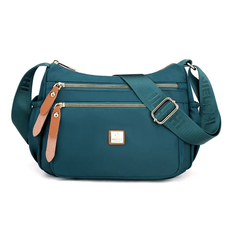 Shoulder strap bag with multiple compartments