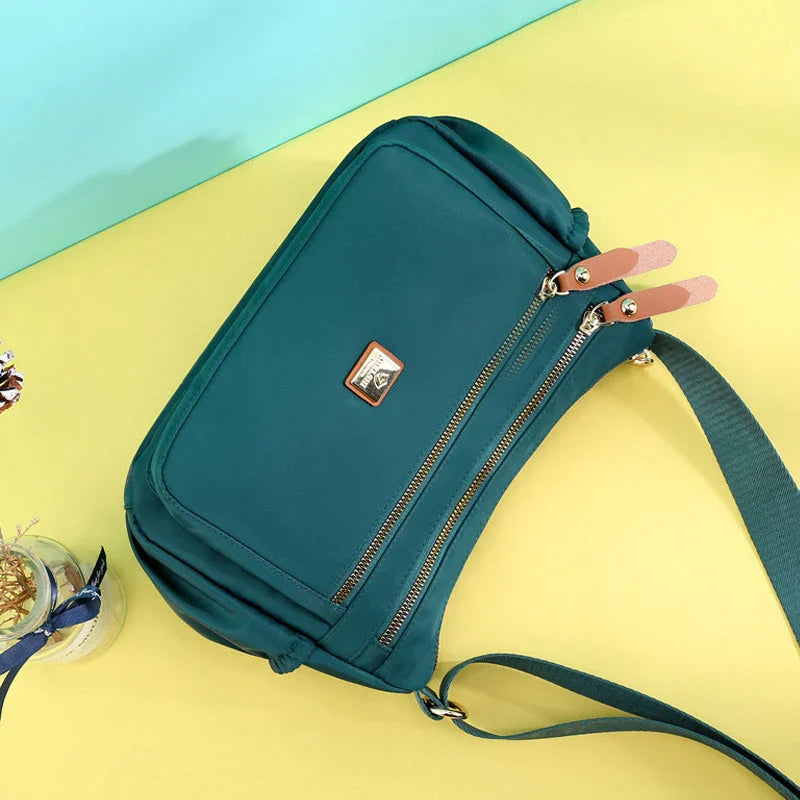 Shoulder strap bag with multiple compartments