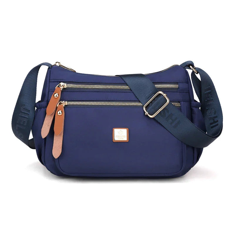 Shoulder strap bag with multiple compartments