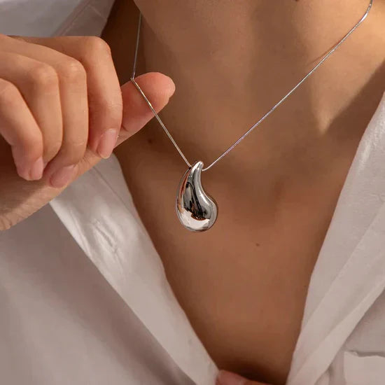 Women's Elegant Gold Teardrop Earrings | Sleek Polished Design